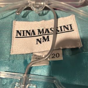 Nina Massini, 20, aqua, shimmery, skirt set